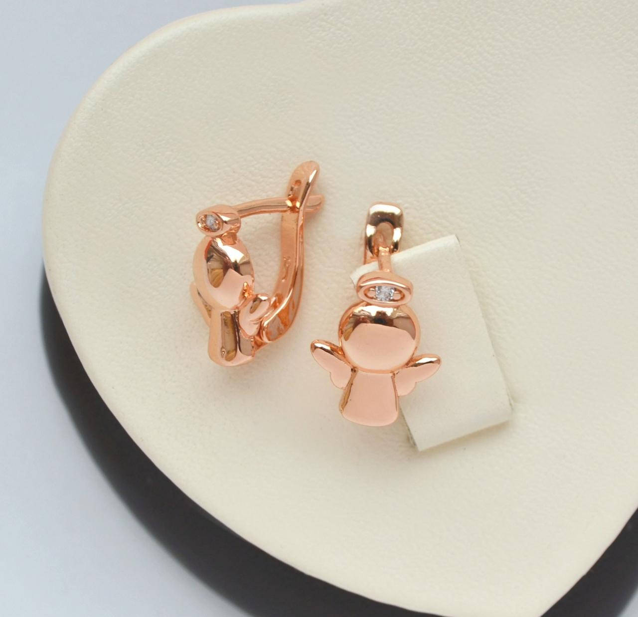 

Позолоченные серьги Ангелочки с белыми цирконами.