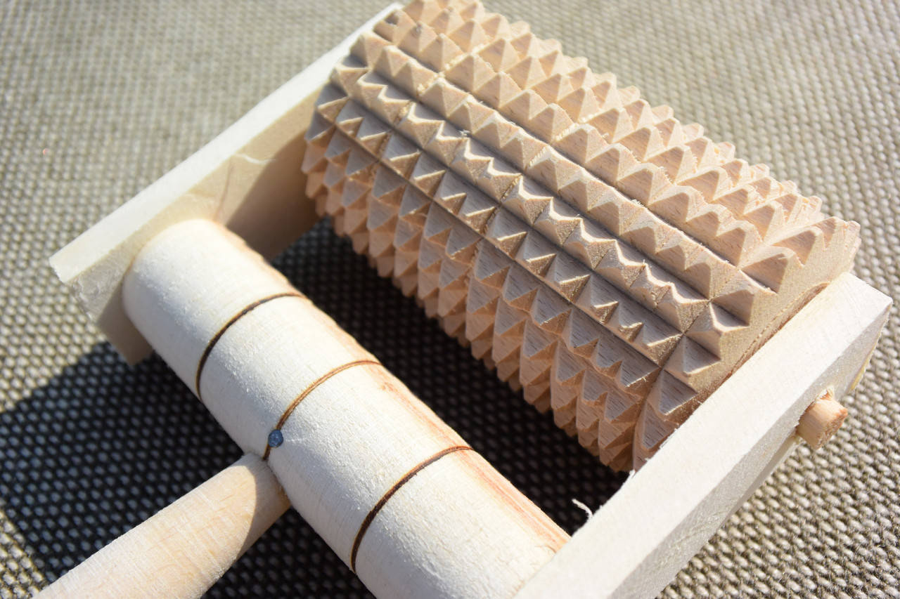 

Масажер з ручкою на 1 ролик, ручна робота.