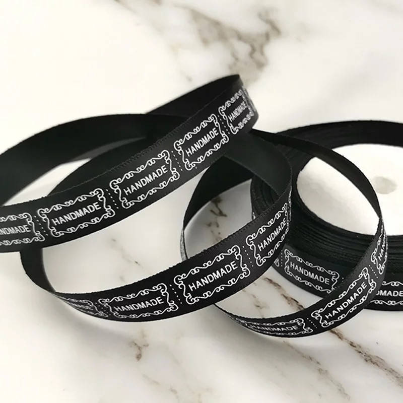 

Атласная лента с надписью HandMade черная ширина 1,5 см