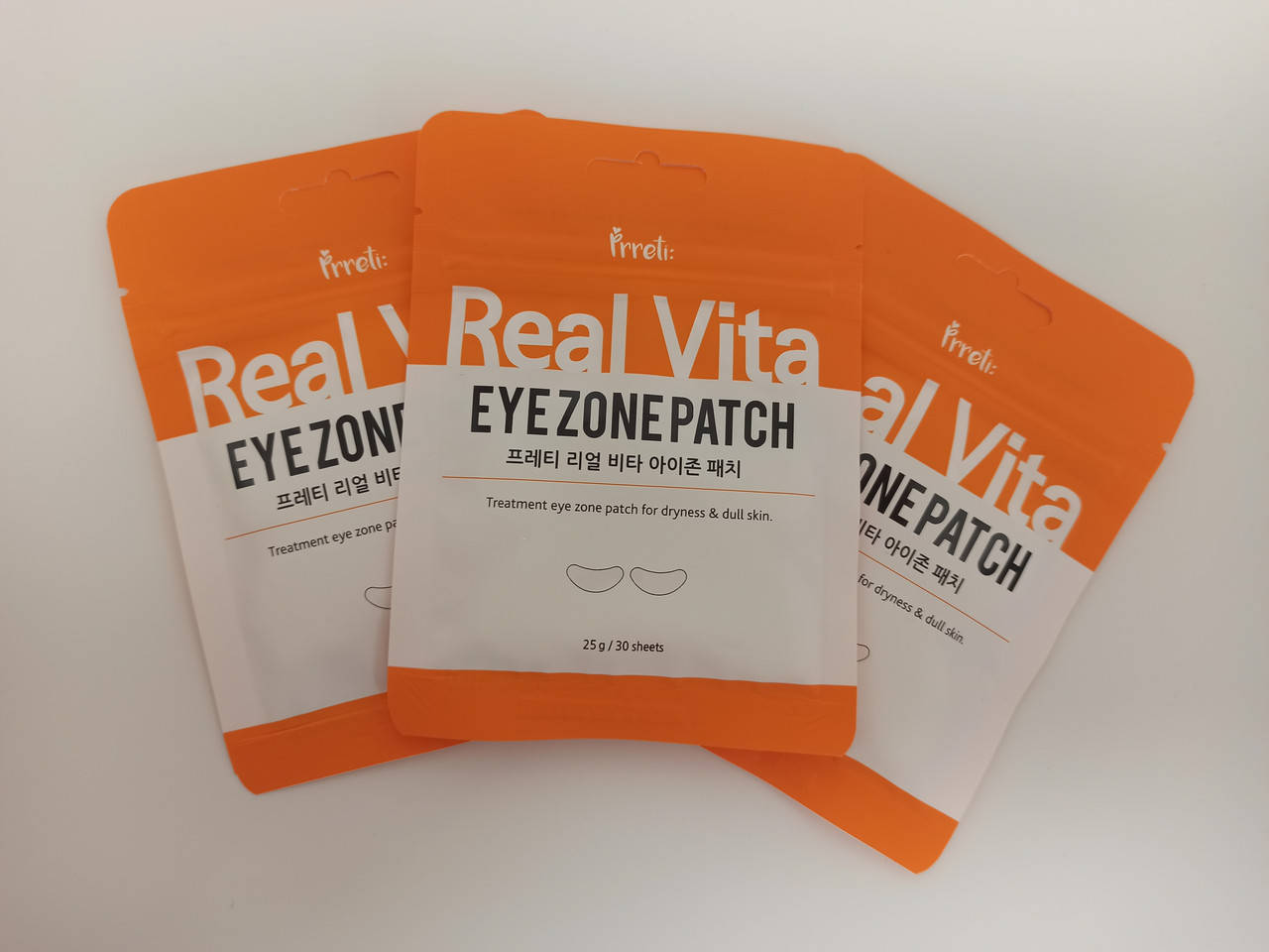 

Осветляющие тканевые патчи для глаз с витаминами prreti real vita eye zone patch