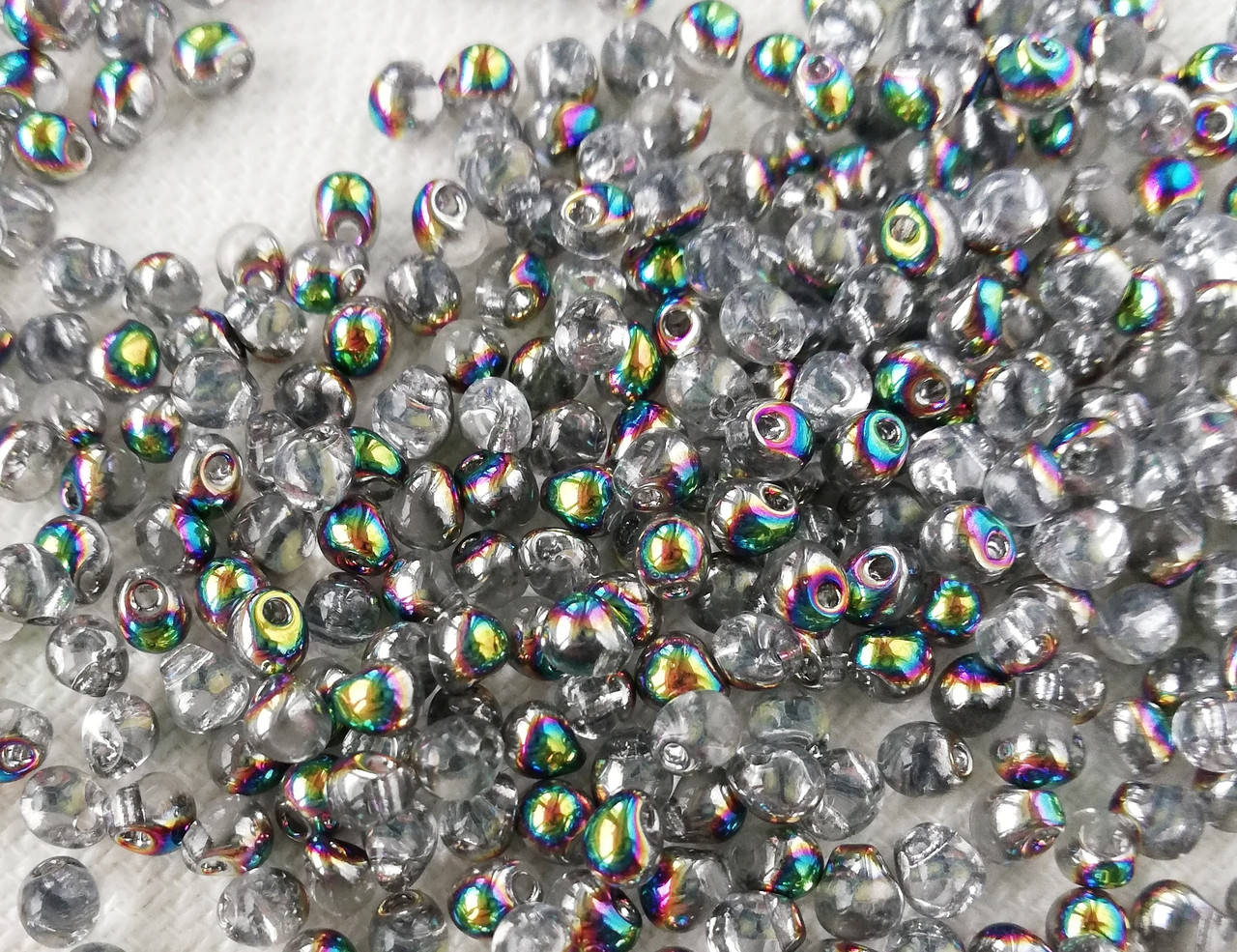 

Miyuki Drops 3,4 mm Crystal Vitrail 5 г.