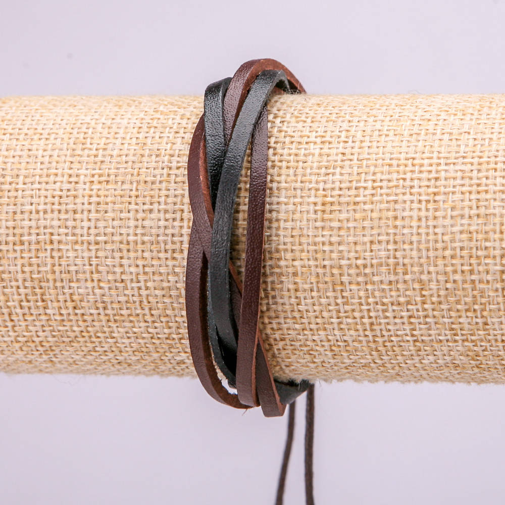 

Браслет L-18-25см s-12мм эко кожа цвет черный с коричневым на затяжке