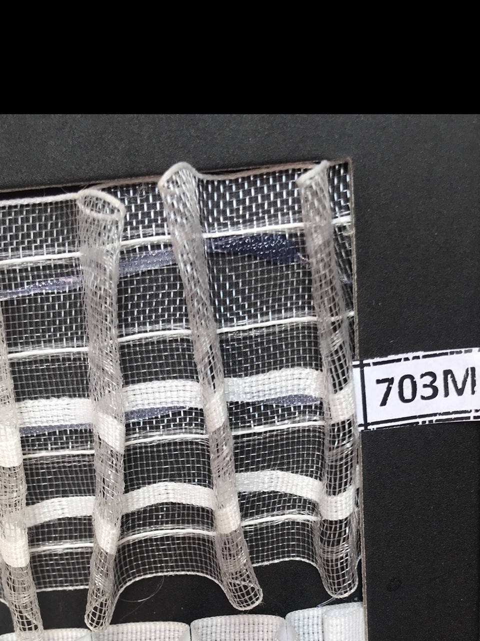 

Тесьма шторная 6 см на 4 нити 703 органза