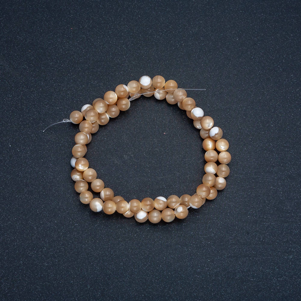 

Бусины на нитке натуральный Перламутр беж. гладкий шарик d-6мм L-39+-