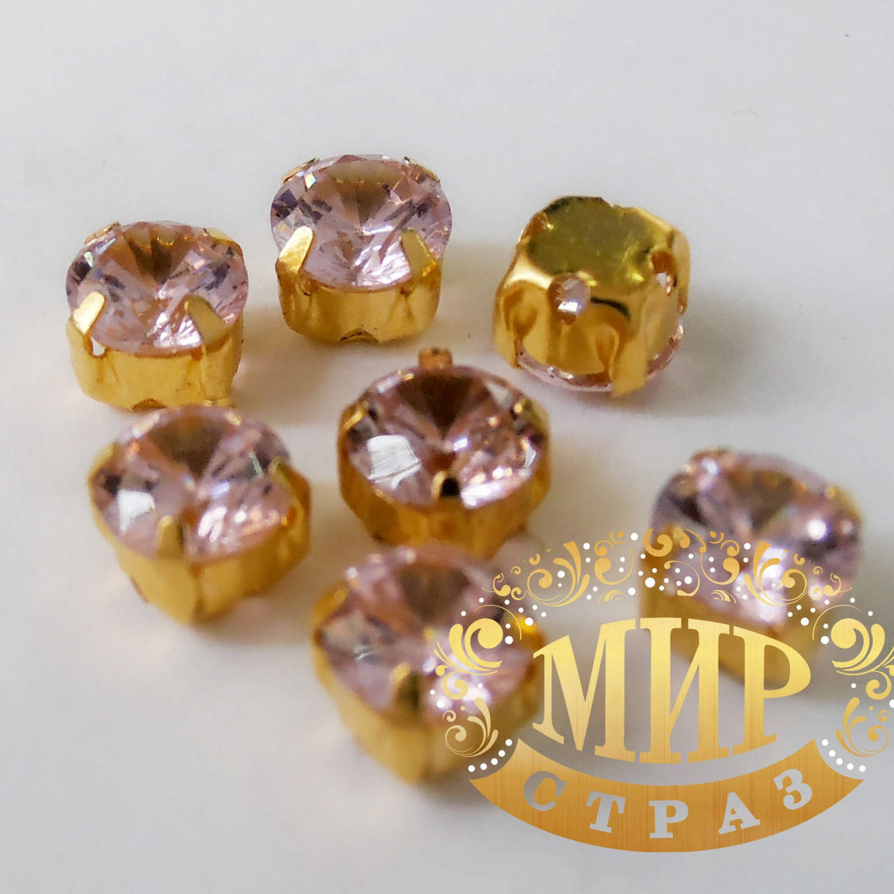 

Фианиты в цапах.Цвет Lt.Rose. 5мм