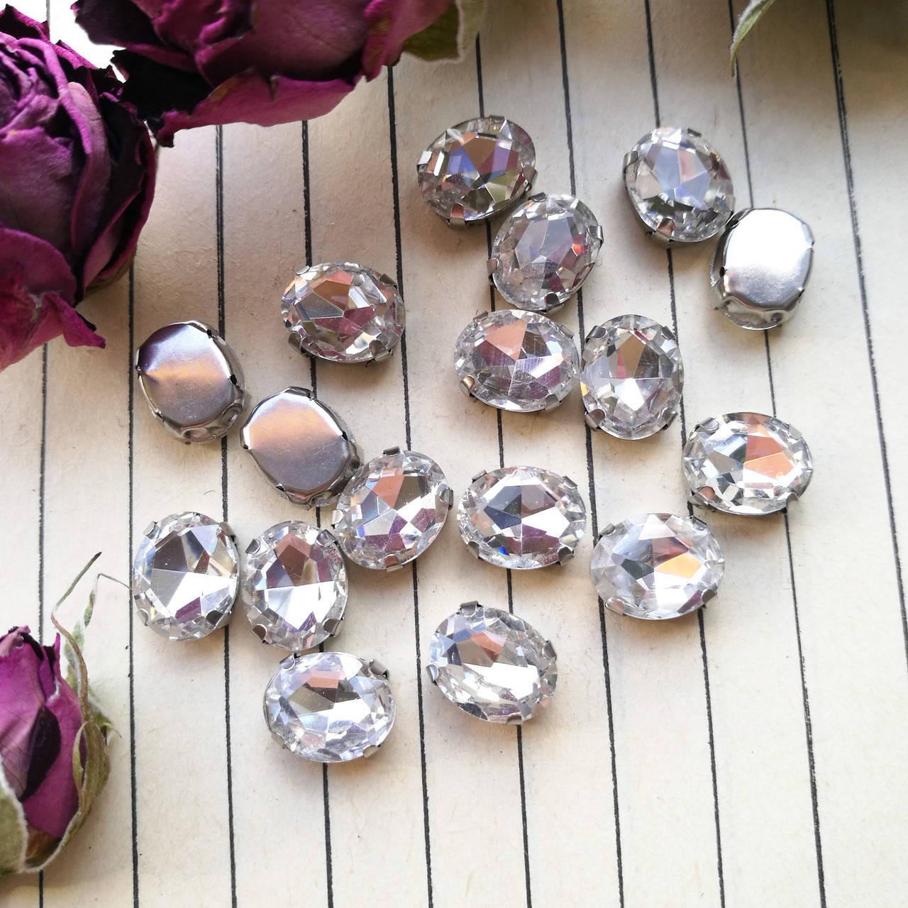 

Стрази в цапах, овал 8*10 мм, колір Crystal
