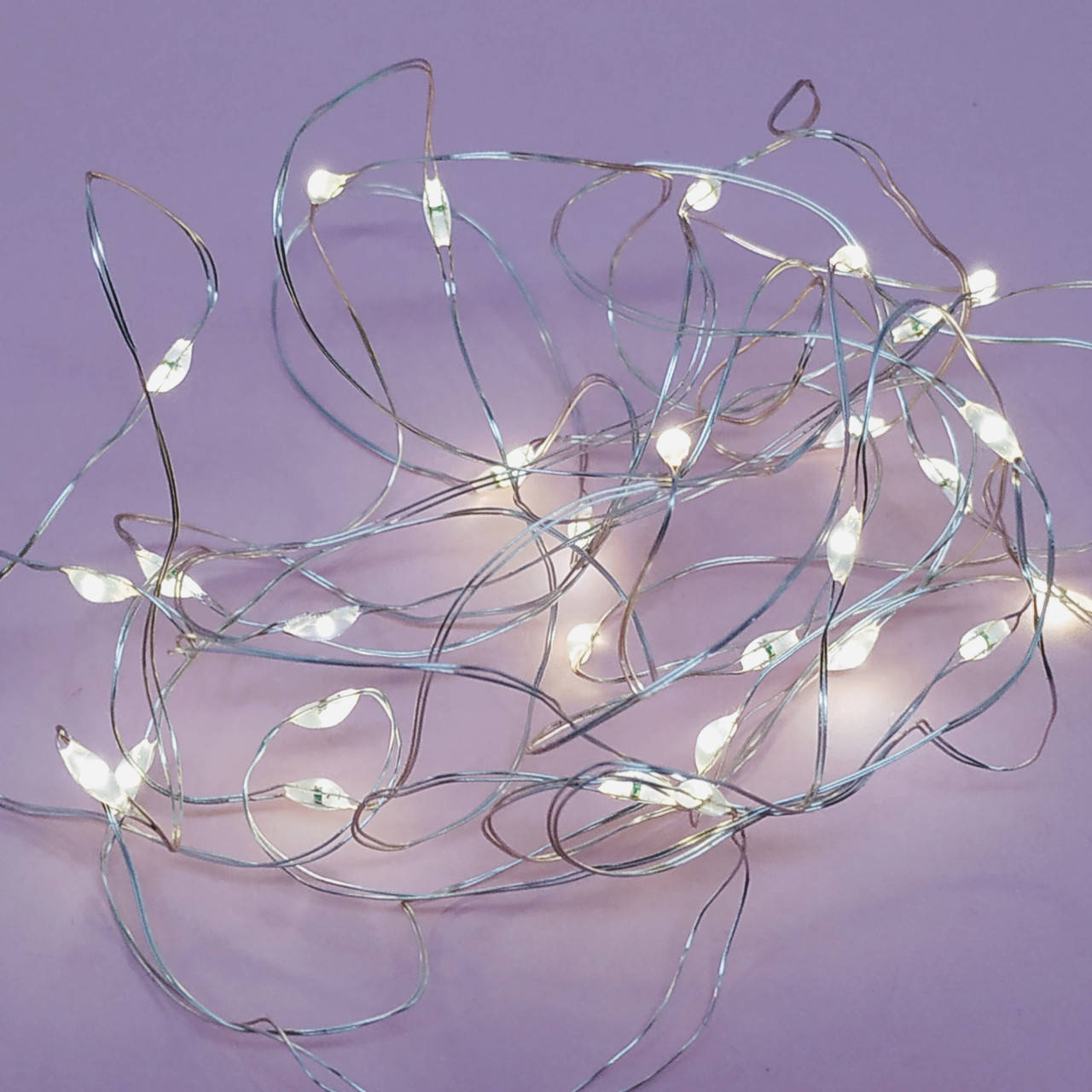 

Гирлянда на медной проволоке Капля росы - 3м 30 лампочек (свет тепло-белый)