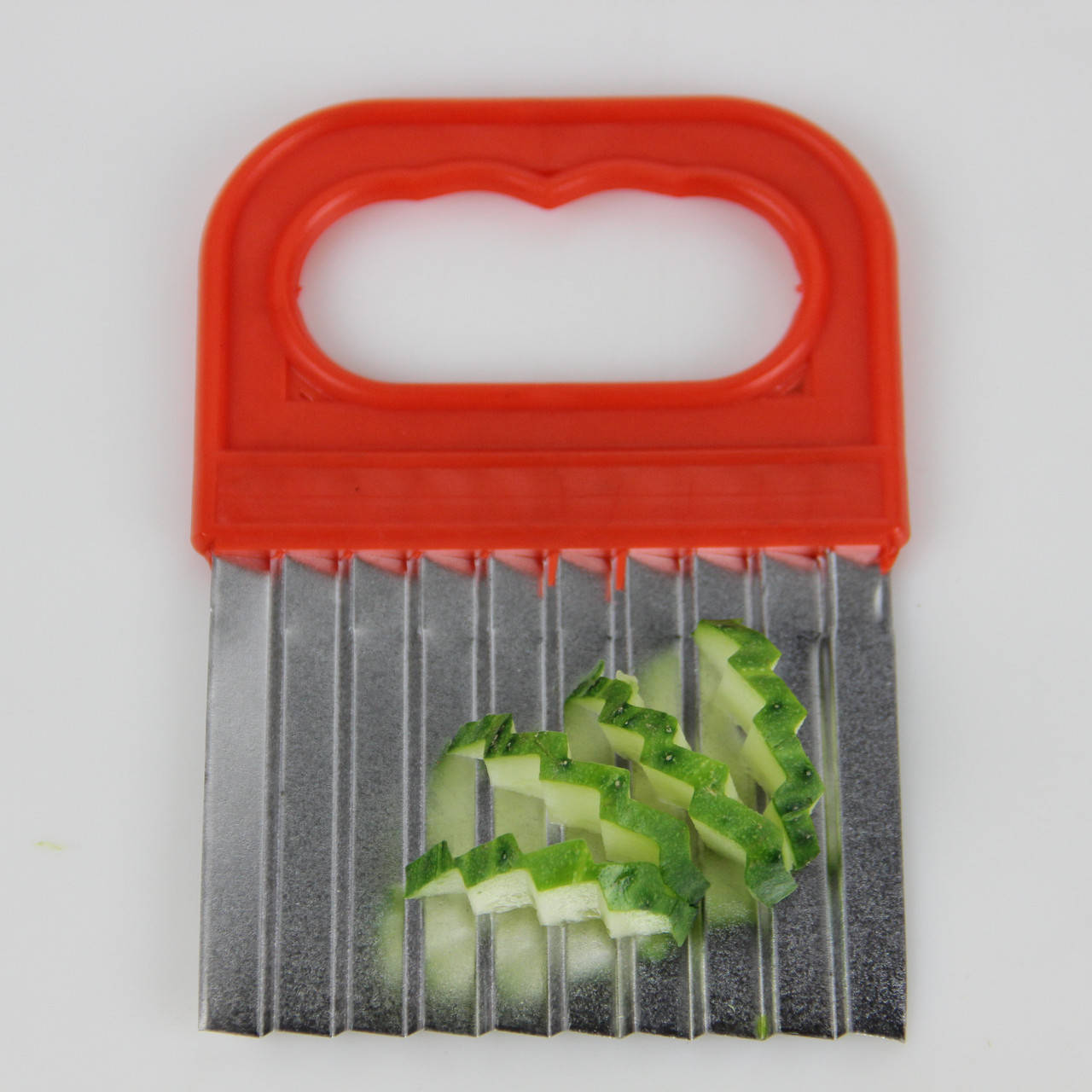 

Нож для нарезки сыра и овощей фигурный 9х13.5 см