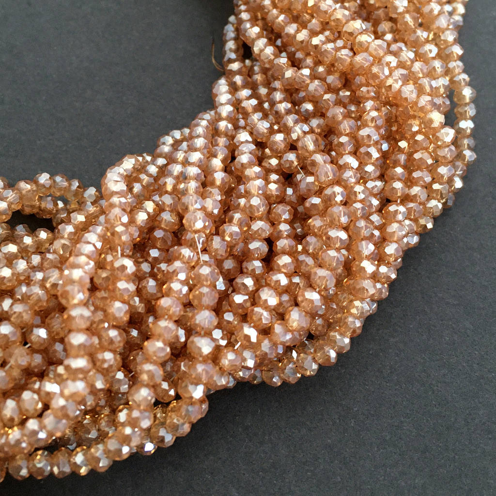 

Рондели 2х3 мм (стекло). Светло-коричневый с АБ. 180-190 шт.