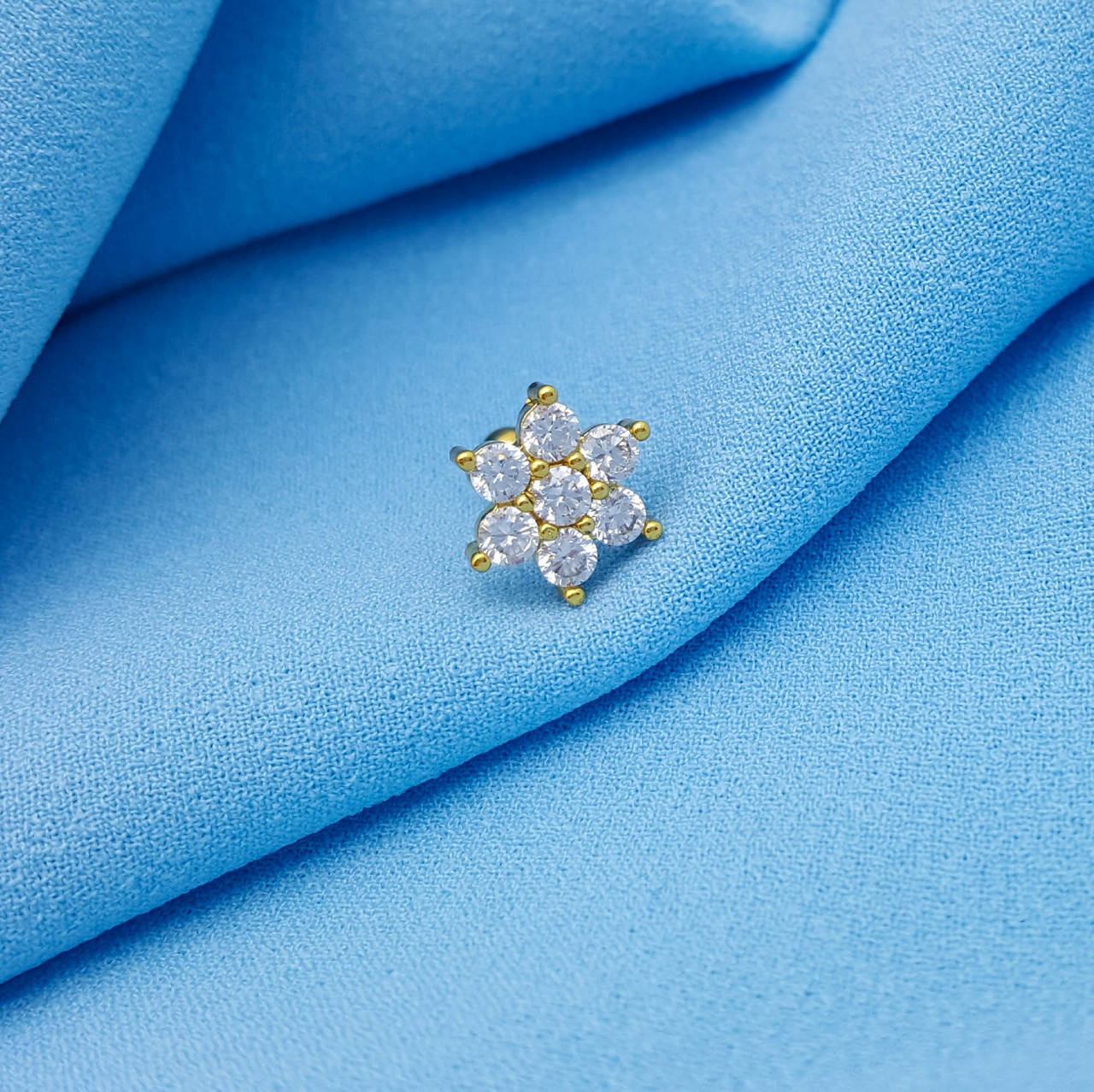 

Дизайнерский пирсинг, Цветок с камешками на закрутке, под золото