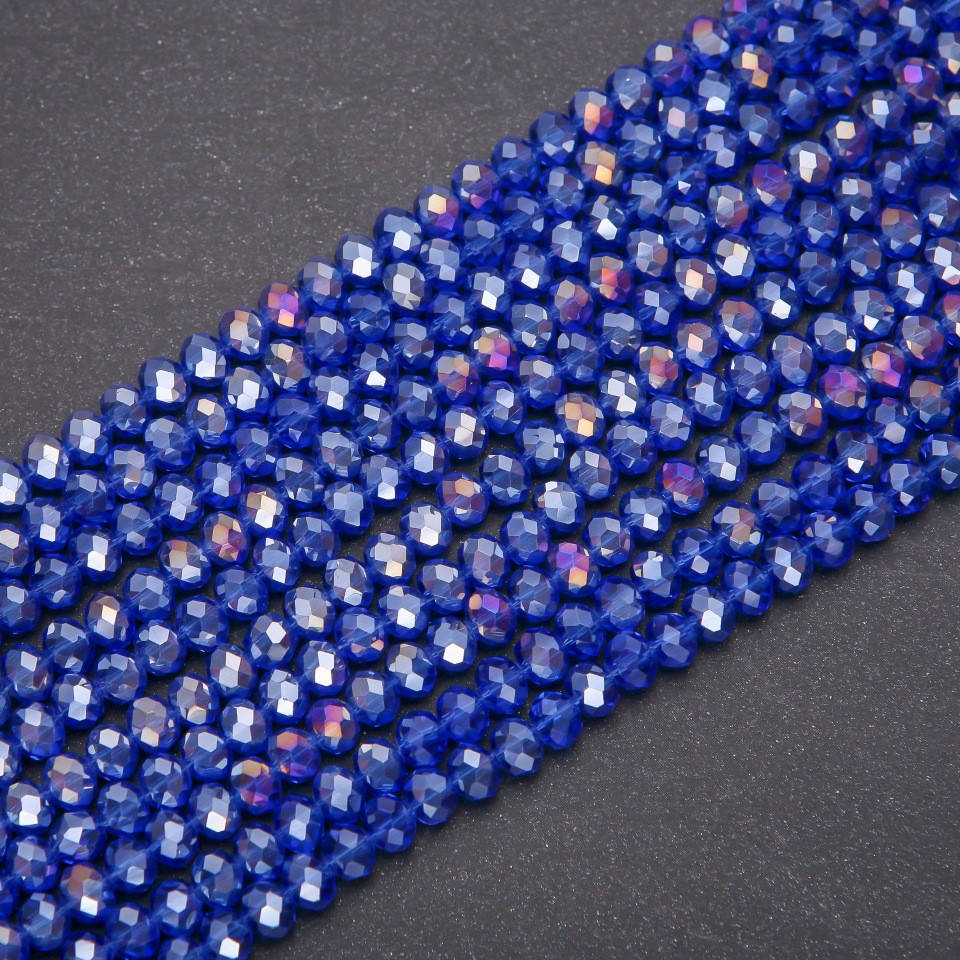 

Бусины стекло прозрачное синее с напылением бензин "рондель" d-6х4,5(+-)мм нитка L-38см, Синий