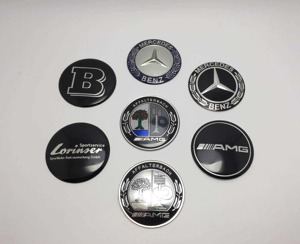 

Эмблема клавиши управления мультимедиа Mercedes AMG Brabus Lorinser Affalterbach
