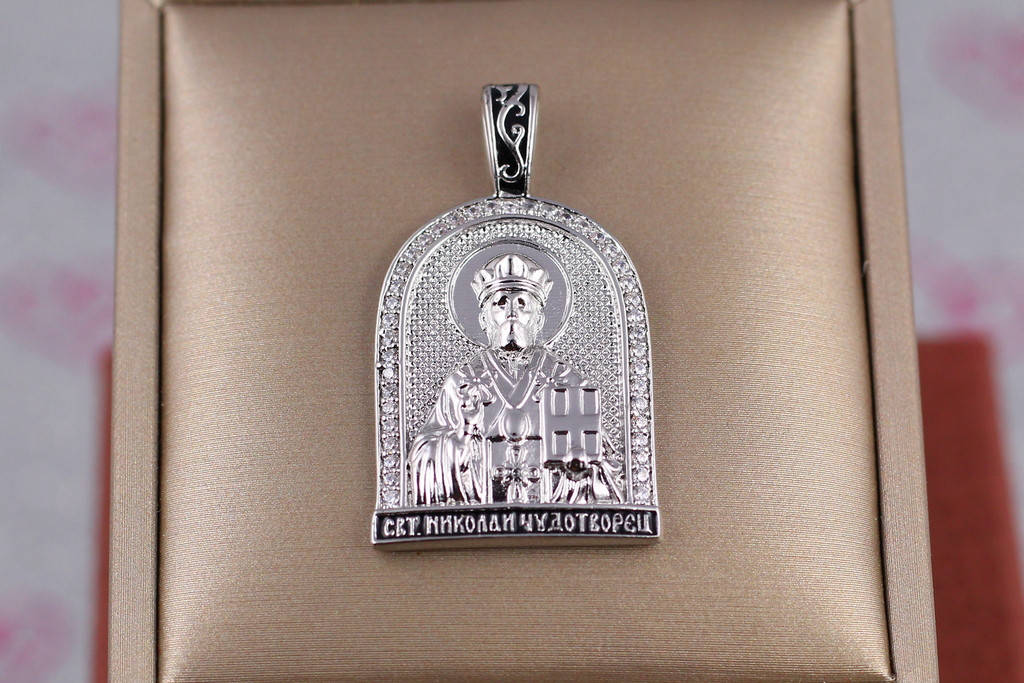 

Ладанка Xuping Jewelry в форме арки с камнями Святой Николай Чудотворец литое ушко 3 см серебристая