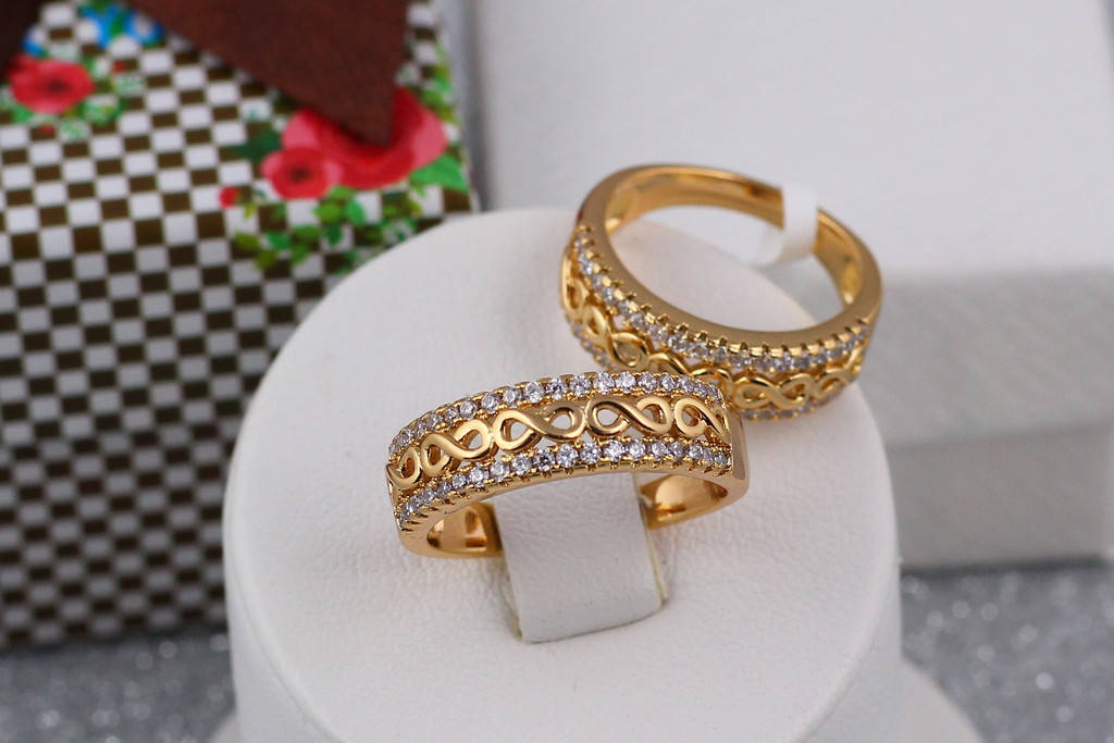 

Кольцо Xuping Jewelry бесконечность с двух сторон камни р 18 золотистое