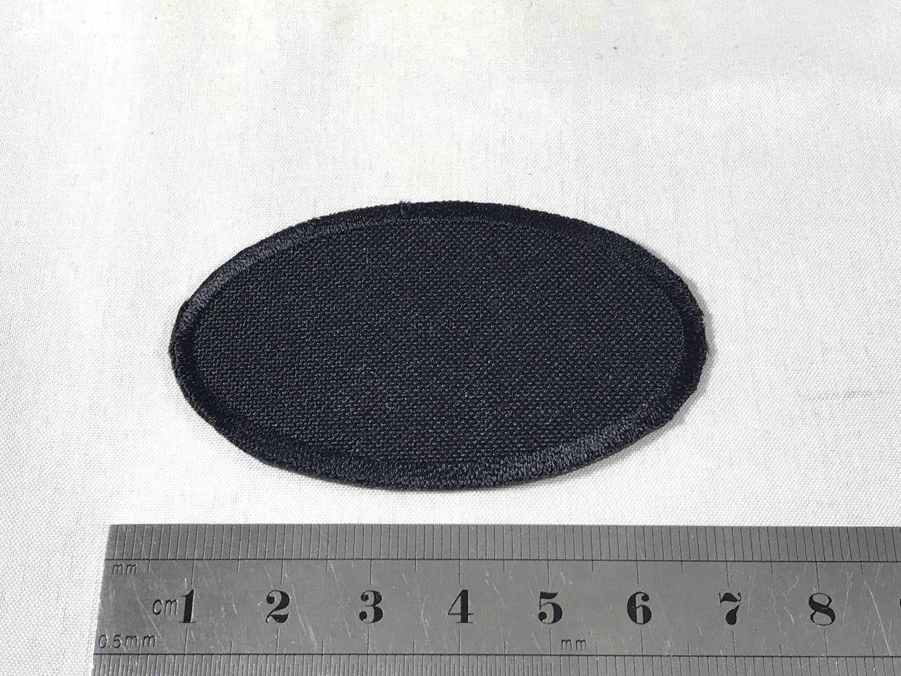 

Нашивка Овал Разные цвета 65х40 мм Черный