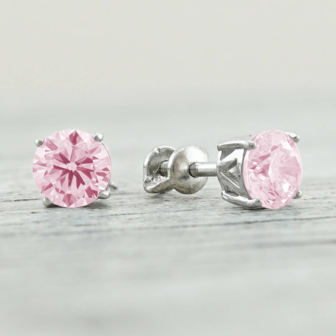 

Серебряные серьги гвоздики ps331e розовые фианиты размер 6х6 мм вес 1.41 г