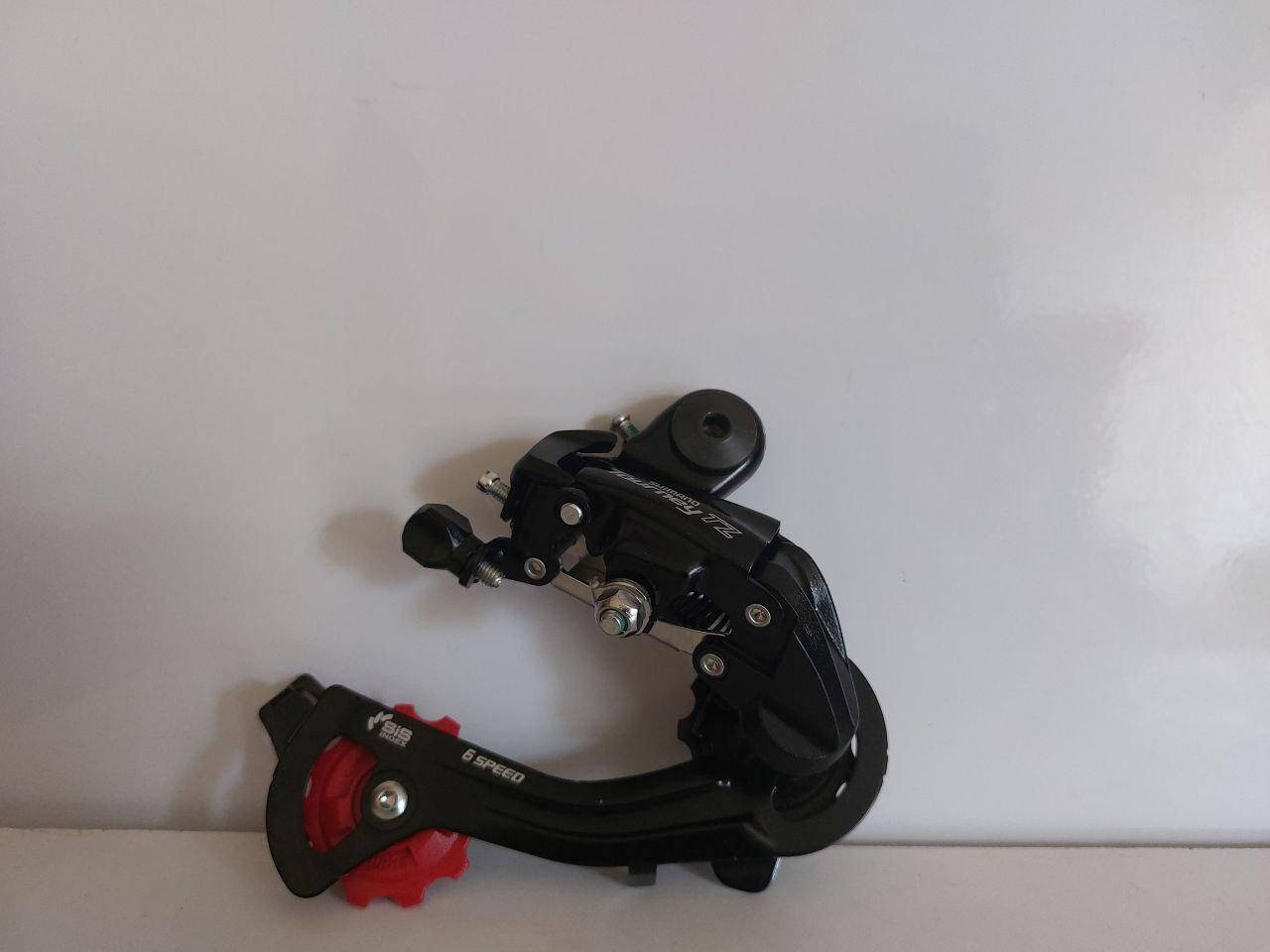 

Задний переключатель скоростей 6-7стк под болт "Shimano"