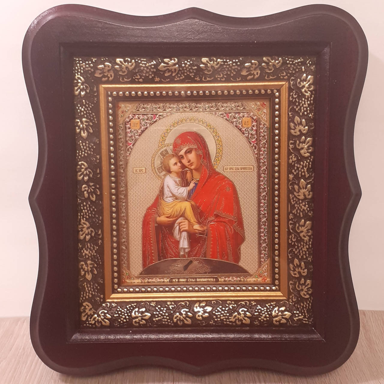

Икона Пресвятая Богородица Почаевская, лик 10х12 см, в темном деревянном киоте