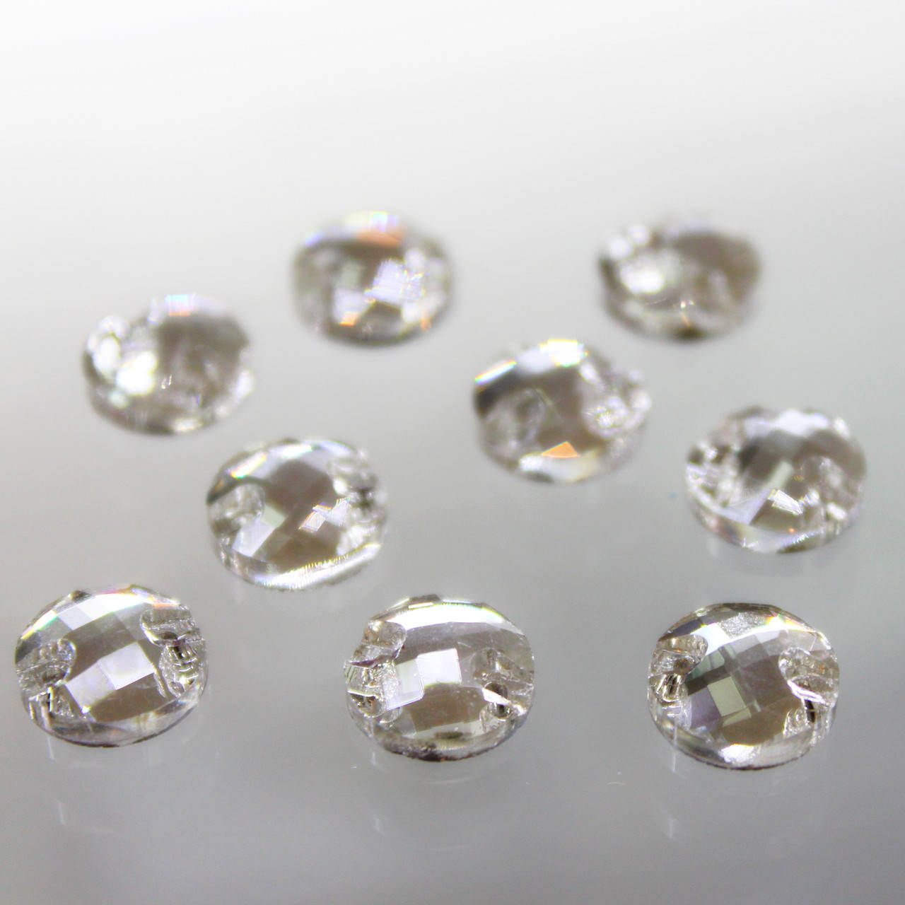

Пришивные стразы 10мм круглые с шахматной огранкой Crystal