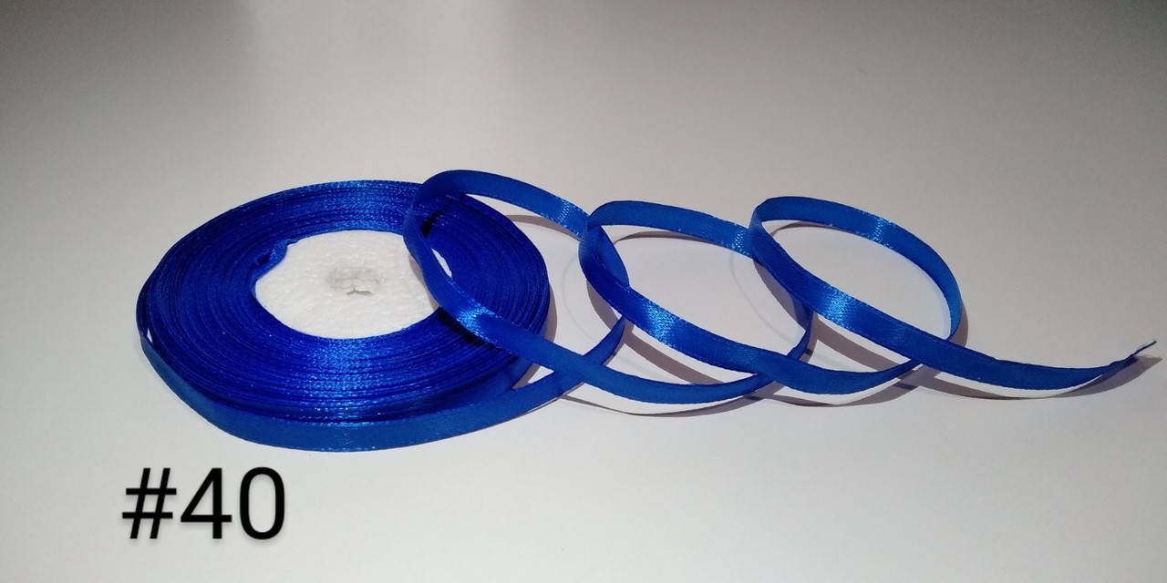 

Стрічка атласна. 0,6 см х 23 м. синя