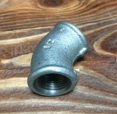 

Угольник чугунный 45° оцинкованный 3/4