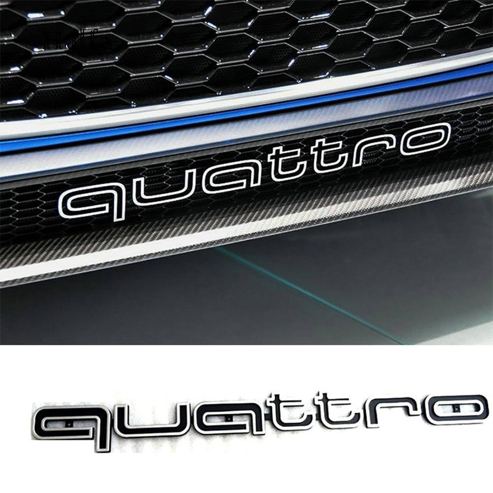 

Эмблема решетки Audi Quattro