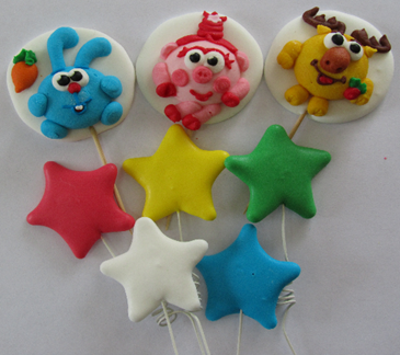 

Украшения из мастики на торт "Смішарики"