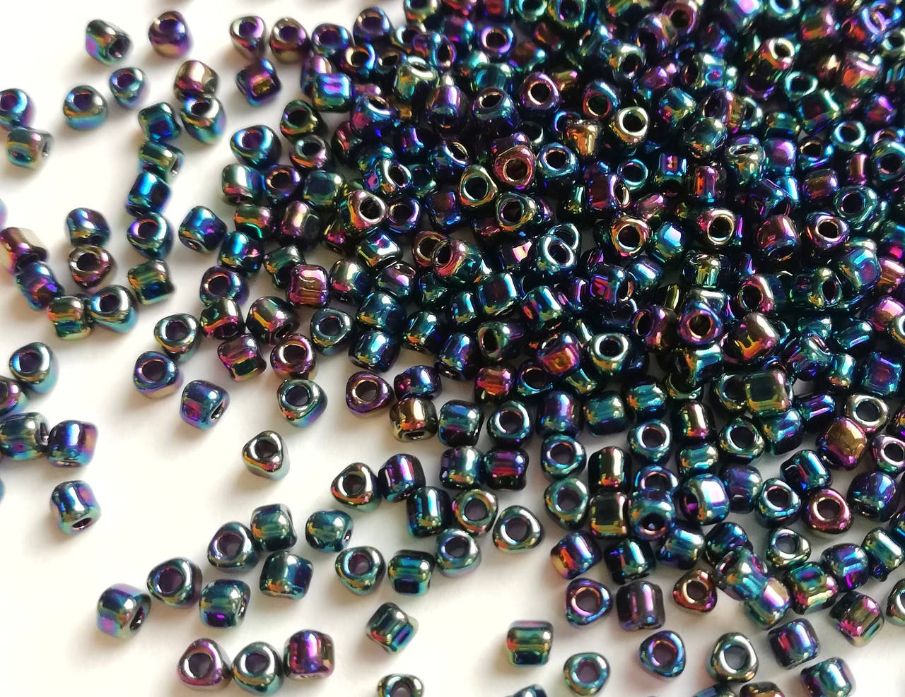 

Miyuki Triangle Beads 10/0 Metallic Variegated Blue Iris 5 г.