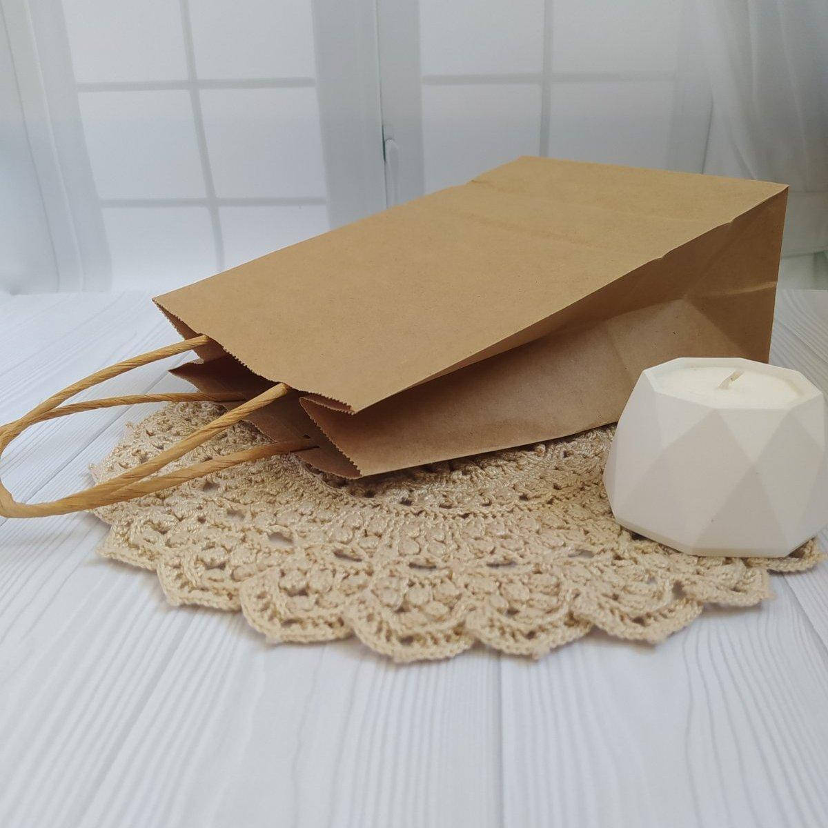 

Крафт пакет з ручками (15х8х21см)
