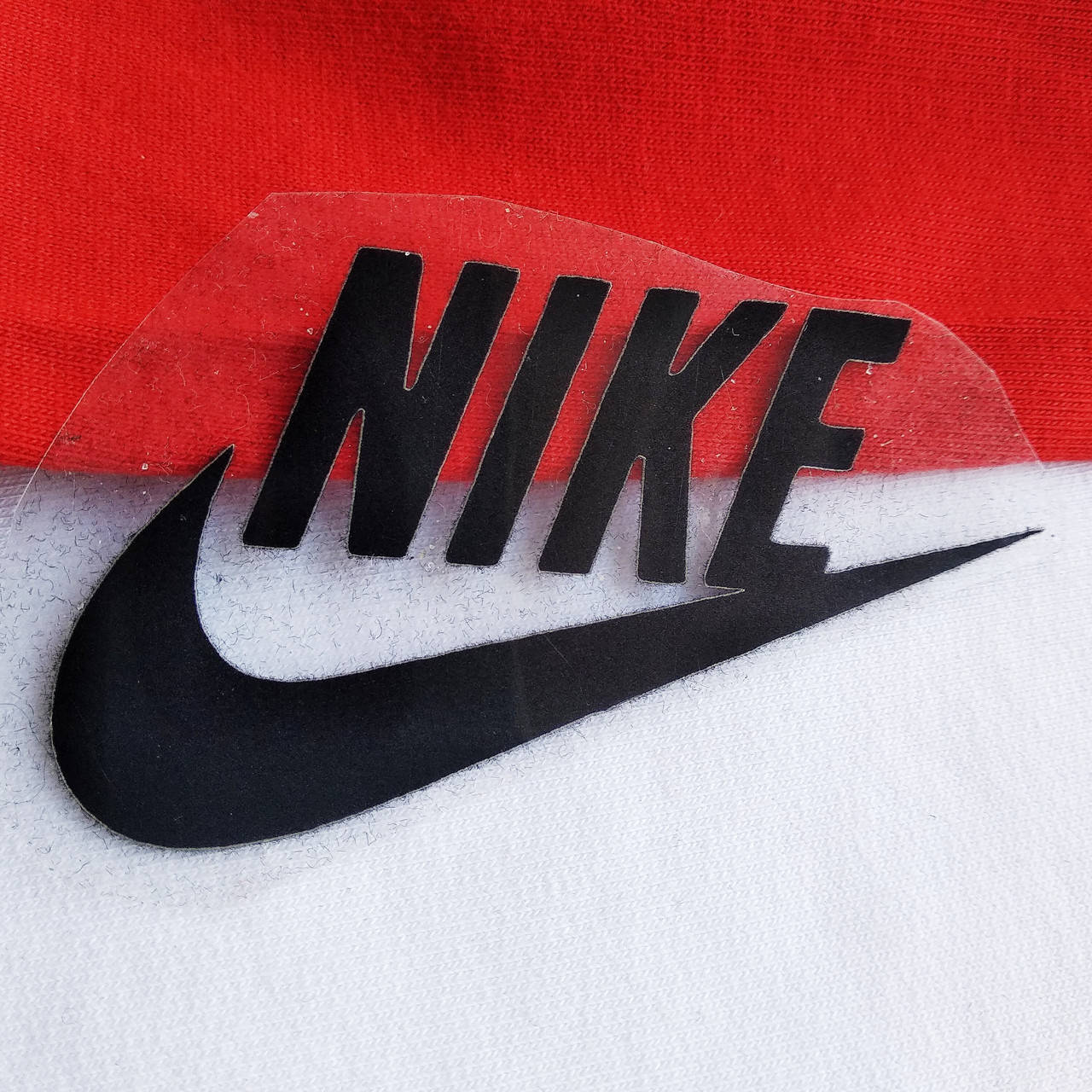 

Термотрансфер логотипом NIKE