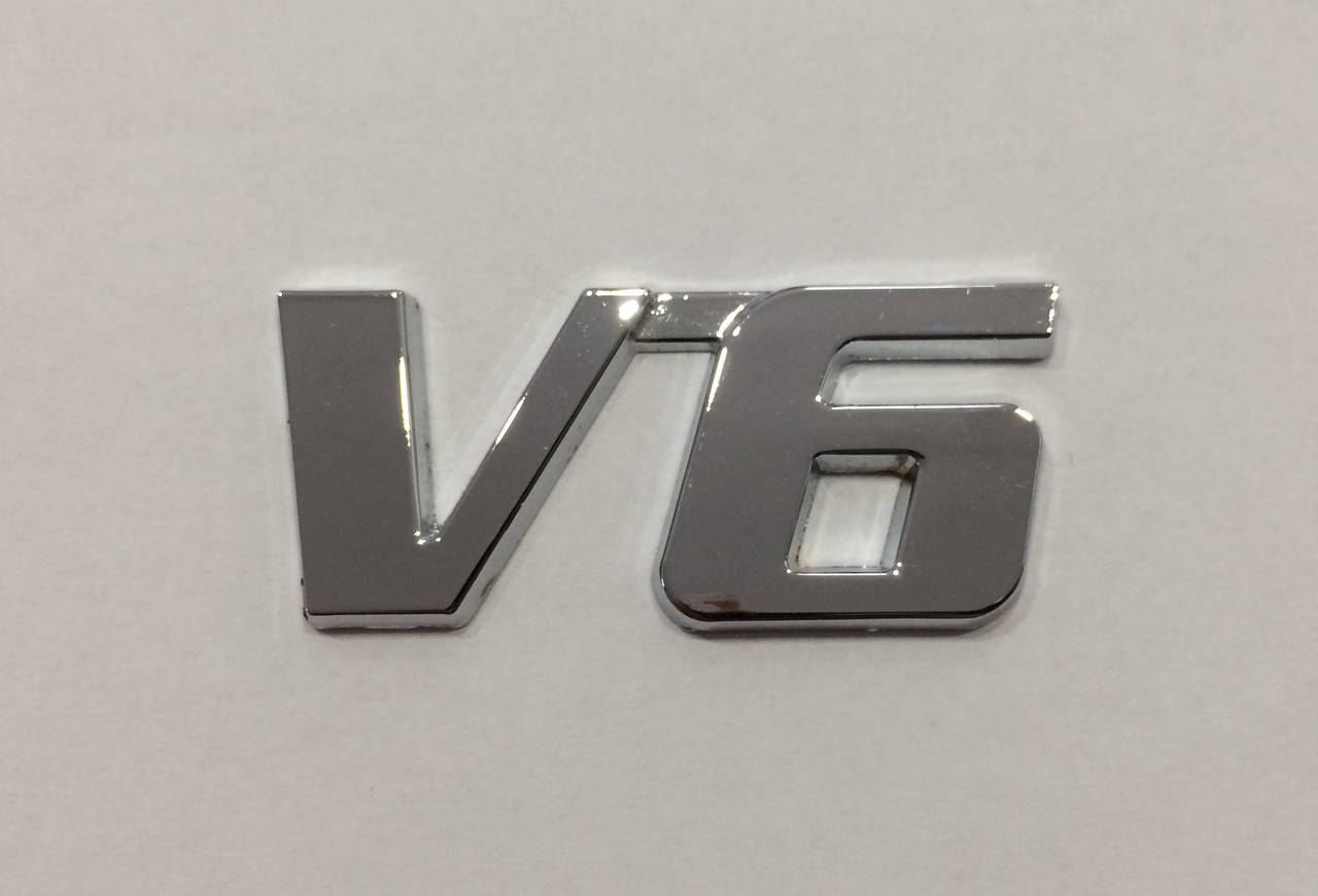 

Эмблема V6