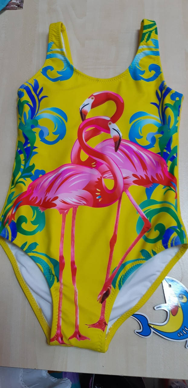 

Детский купальник желтый с фламинго