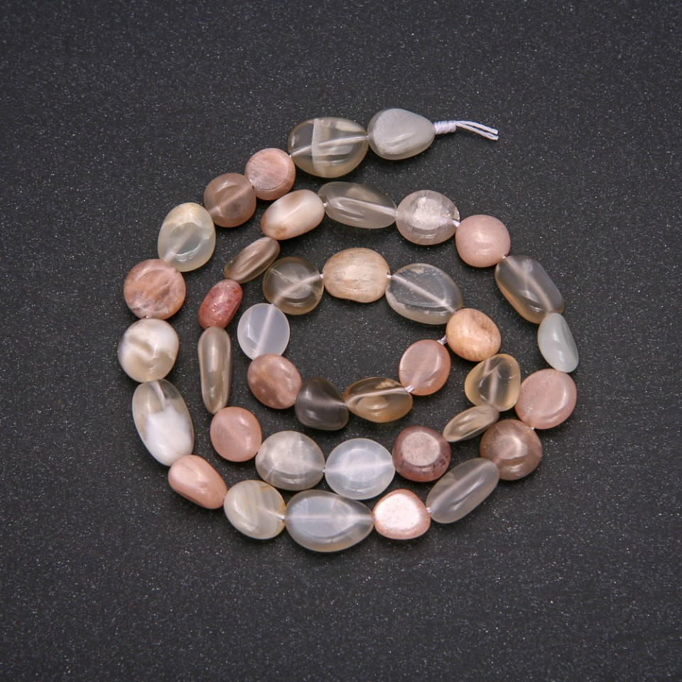 

Бусины из натурального камня Селенит галтовка d-8х12(+-)мм L-38см