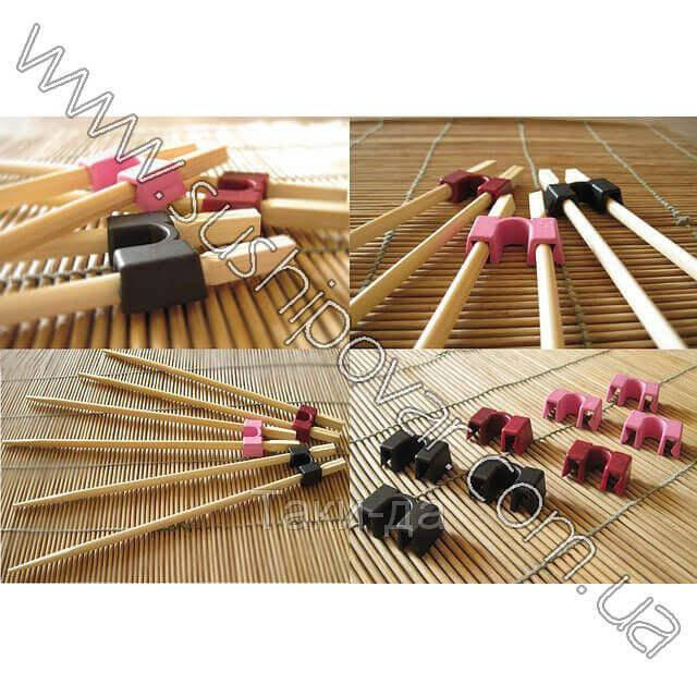 

Учбовий тримач для одноразових паличок