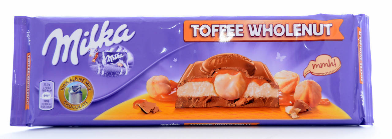 

Шоколад молочный с карамелью и орехами MilkaToffee Wholenut 300г