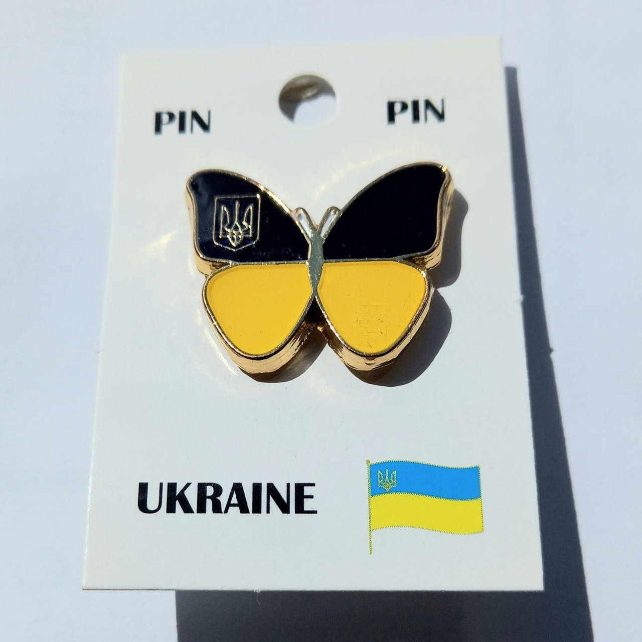 

Значок флаг Украины , бабочка , металл , 26х21 мм.