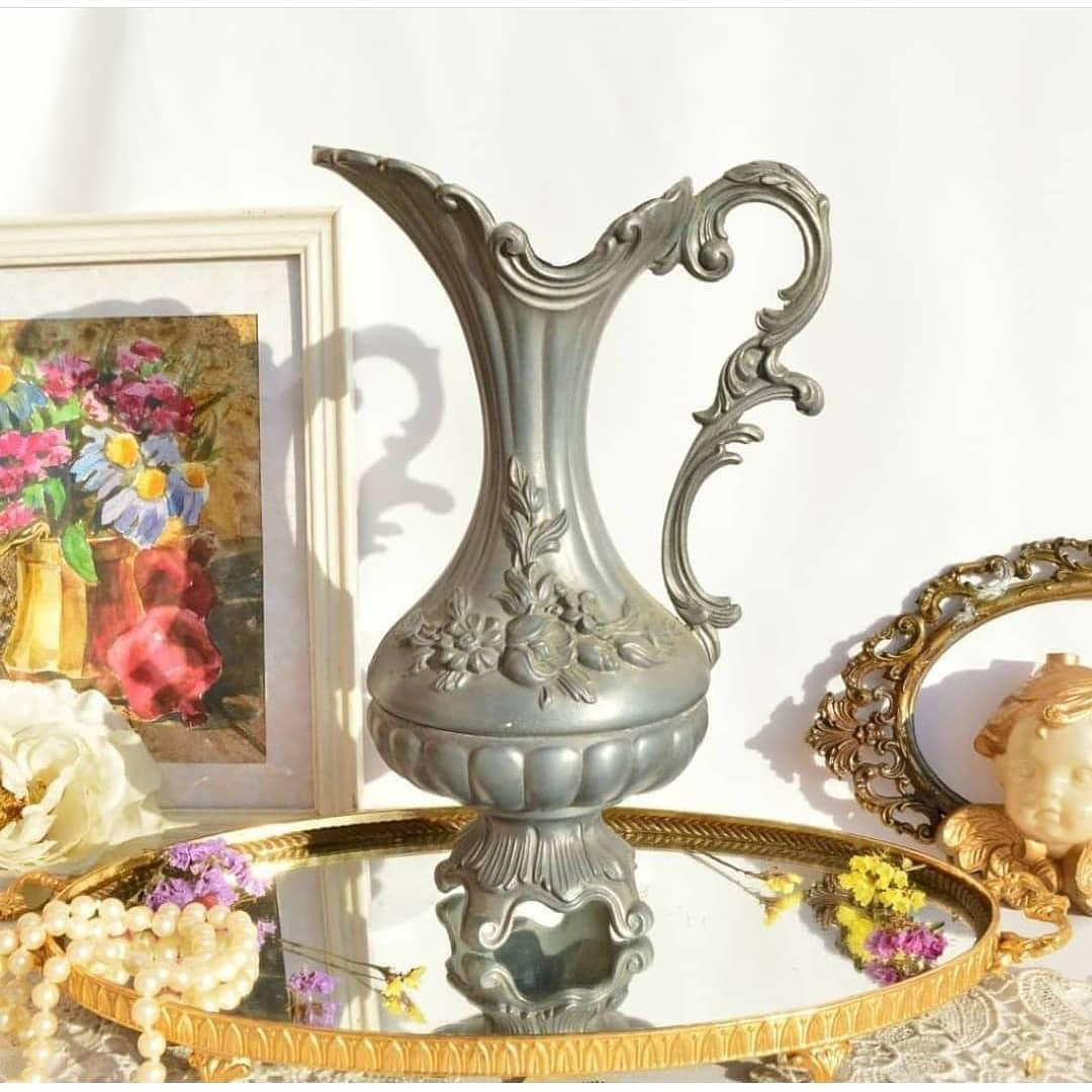 

Старый оловянный кувшин