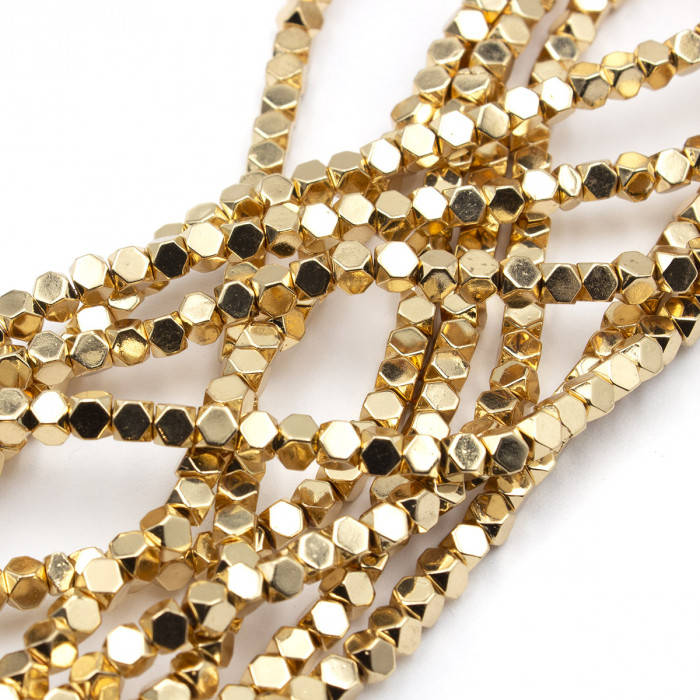 

Натуральный камень, Гематит, бусины на нитке, форма шестигранник , размер 3*3 мм, цвет золото.
